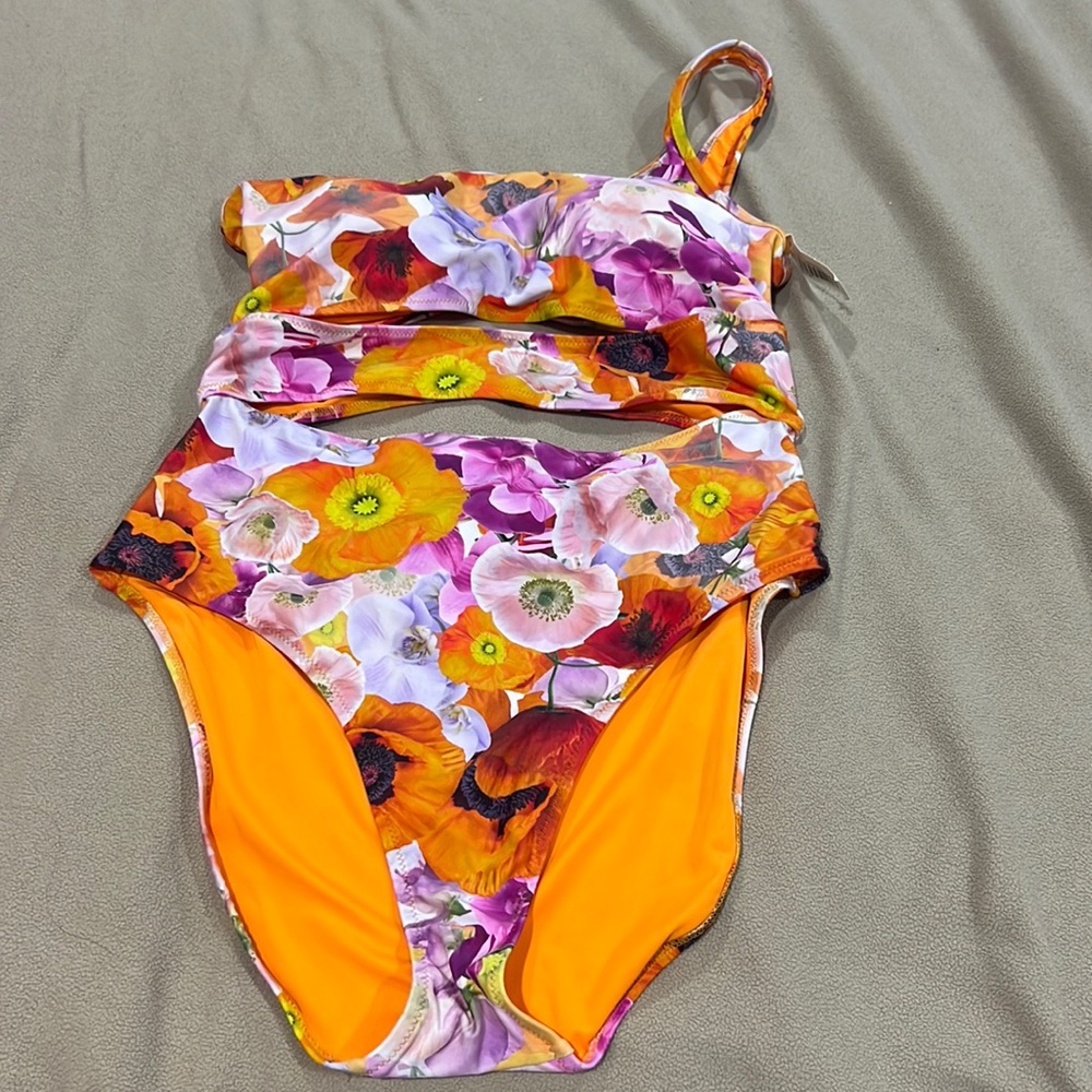 One piece floral one  shoulder swim suits brand new with tag . Orange
